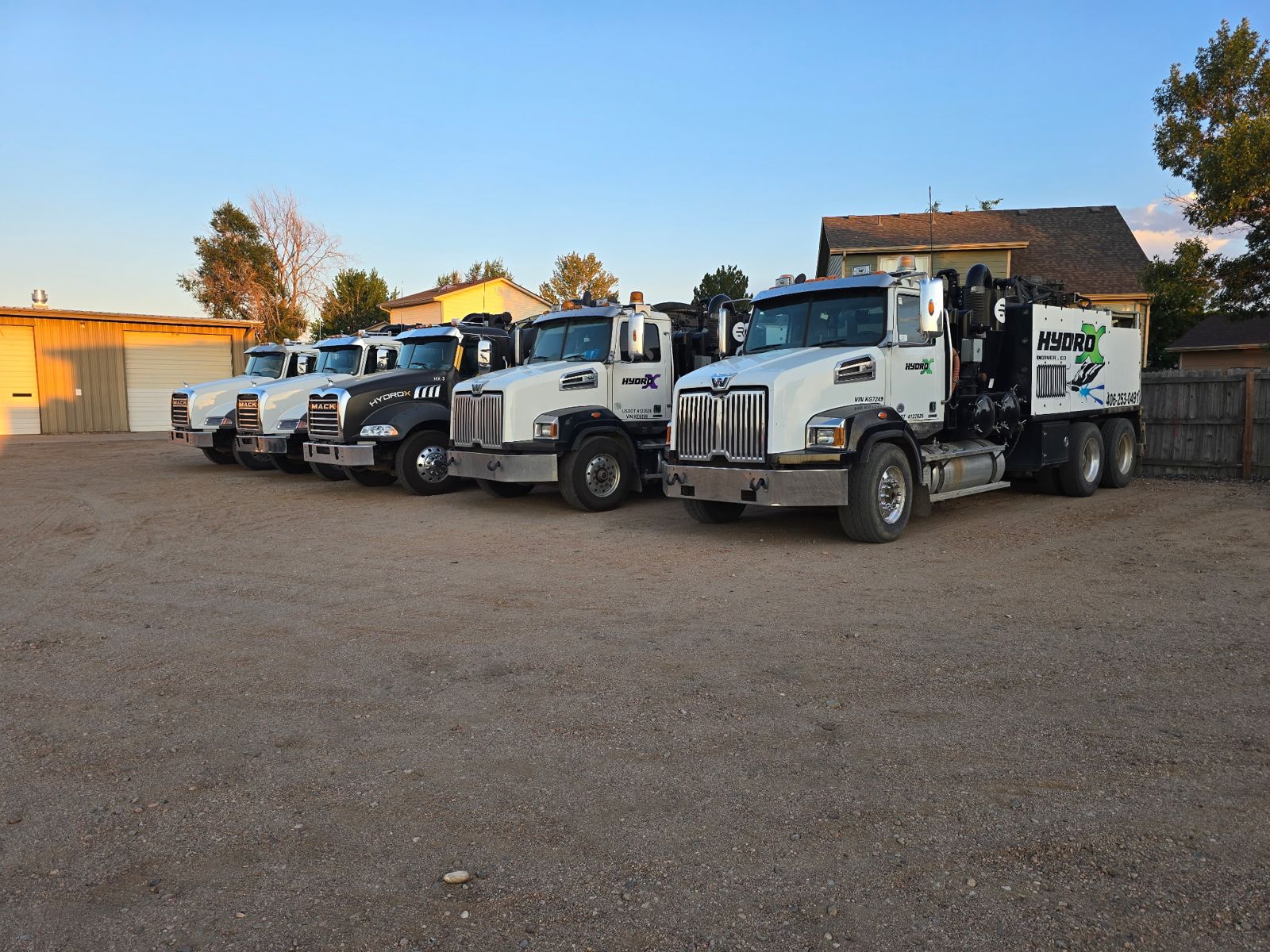 Fleet of five hydro excavation trucks lined up