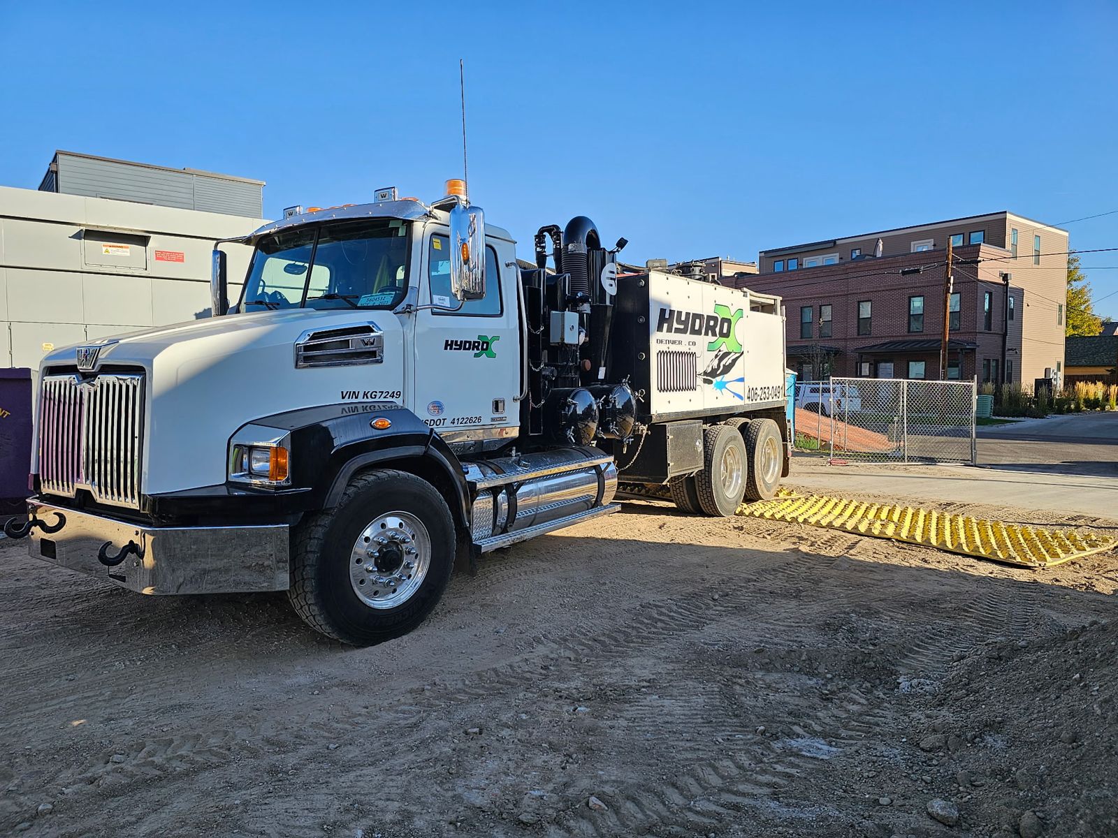 White Western Star HYDRO-X hydrovac truck on an urban jobsite